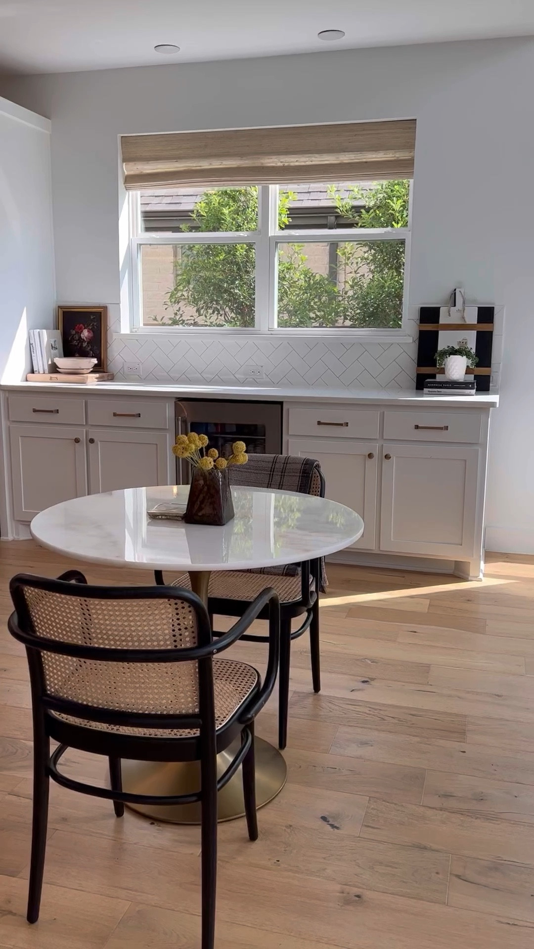 Dining room table, marble dining table, cane dining chair, black charcuterie board, black pendant, travertine tray, cookbooks, dining room decor



#LTKFind #LTKhome #LTKstyletip