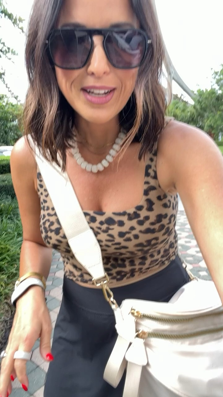 My daughter had her heart set on the leopard Lululemon tank… but we found this Amazon one instead and honestly, it’s so good. 🙌 The fit is flattering, it’s super comfortable for park days, and the price is a whole lot easier to justify. Wearing a small!

#amazonfashion #amazonfinds #disneystyle #disneyoutfit #amazonstyle #themeparkstyle #summeroutfit #affordablefashion #amazonmusthaves #disneytrip #ltkstyle #ltkfashion