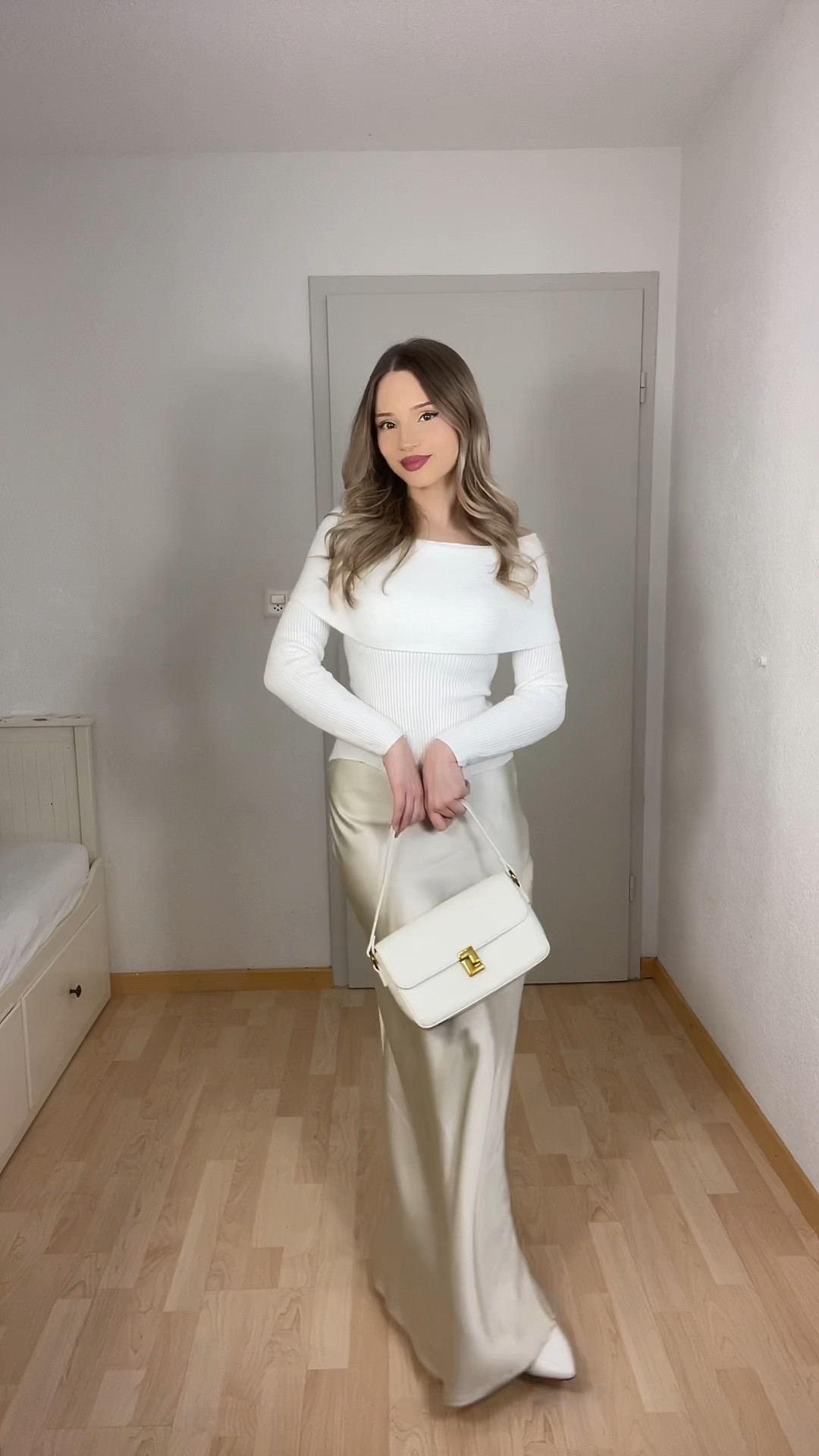 de off shoulder white knit longsleeve satin maxi skirt white herls and bag
