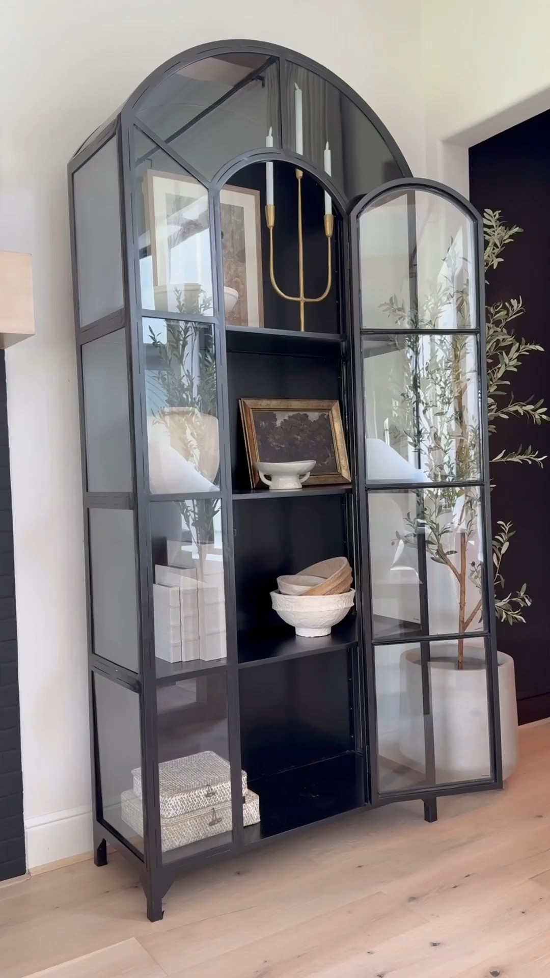 🤎
I've loved this classic cabinet for years plus it's truly a timeless piece that feels heirloom-worthy. ☺️ I love the
arched detail and glass panels that make it look like a work of art.

I now have three in my home! Two in the sitting room and one in the family room — and honestly, l'd add more if I had the space 😬😍

It's perfect for styling any room: dining area, next to a fireplace, bedroom, even an entryway. Solid and sturdy yet surprisingly easy to move. I love filling mine with neutral decor and adding a subtle pop of gold for warmth and contrast. A forever favorite 🖤

👉 I’ve linked the exact product plus similar options for easy purchase!

#LTKHome #TimelessDesign #HeirloomQuality #HomeDecorFinds #ClassicStyle #InteriorInspo

#LTKSaleAlert #LTKHome