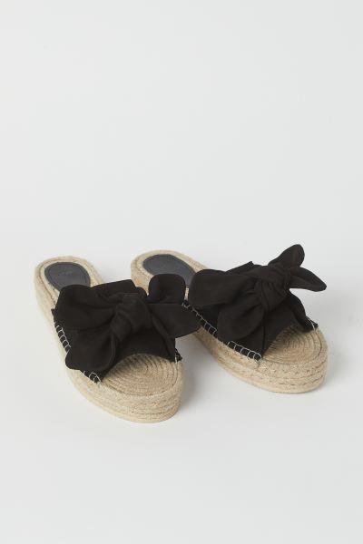 Espadrille mules with wide foot straps in soft suede with a decorative knot. Braided jute footbed... | H&M (US + CA)