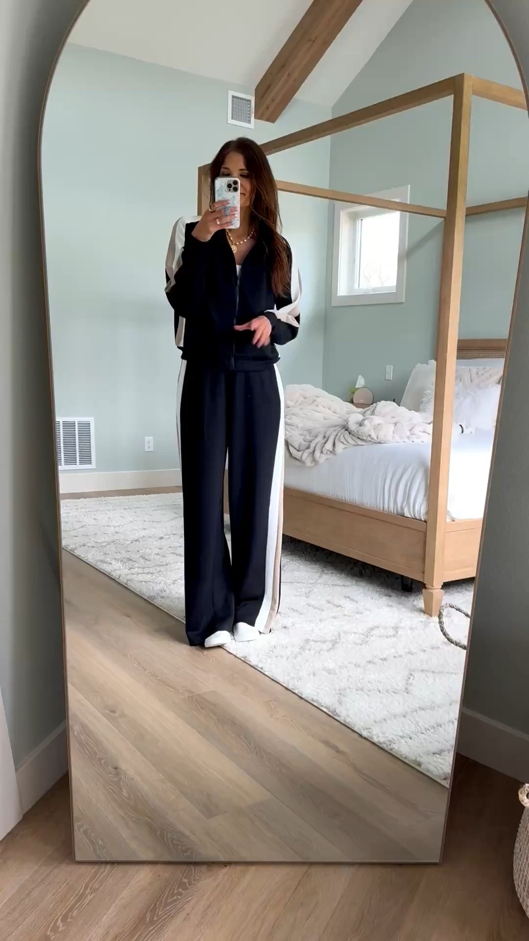 This Spanx set is SO good. The track jacket has a relaxed shape without feeling oversized, and the wide leg pants have that long, drapey fit I’m always looking for. The contrast stripe gives the whole set a sporty look that’s cute enough to wear beyond lounging.

Size L tall pants, XL top

Spanx set, matching set, wide leg pants, track jacket, travel outfit, casual outfit, athleisure, tall girl style, comfy outfit, fall outfit, stangandco

#LTKootd #LTKTravel #LTKTall
