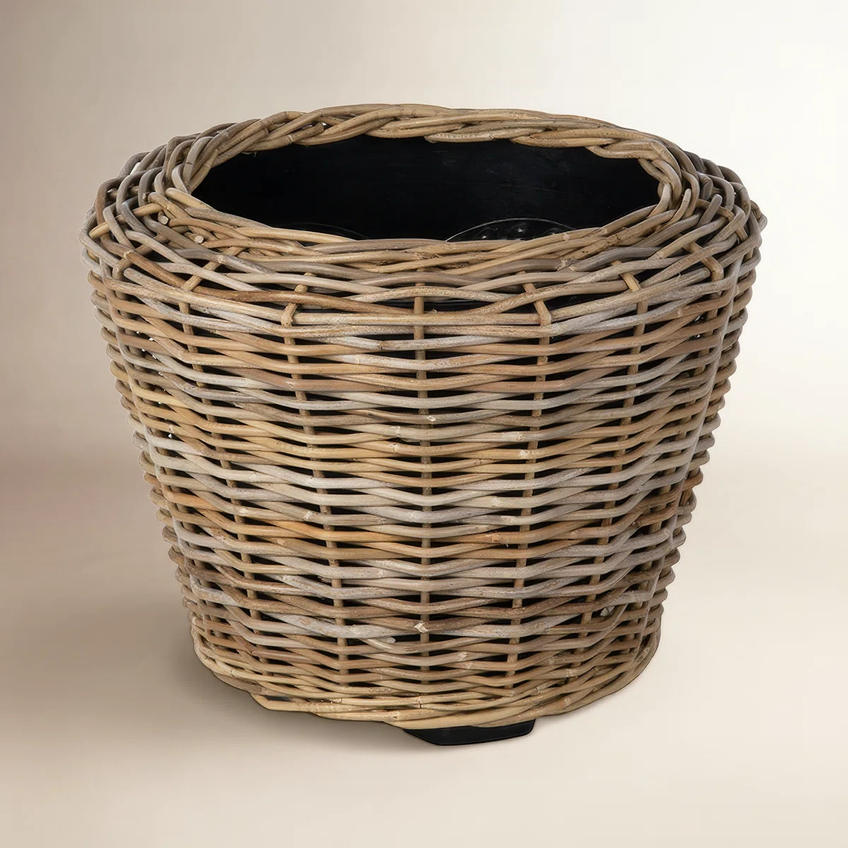 Showcase your houseplants in a decorative planter, hand-woven from rattan. The tight weave makes ... | Wayfair North America