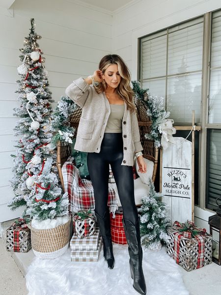 Black faux leather leggings outfit, chunky cardigan sweater, cowgirl boots, thanksgiving outfit, holiday outfits

#LTKfindsunder100 #LTKHoliday #LTKstyletip