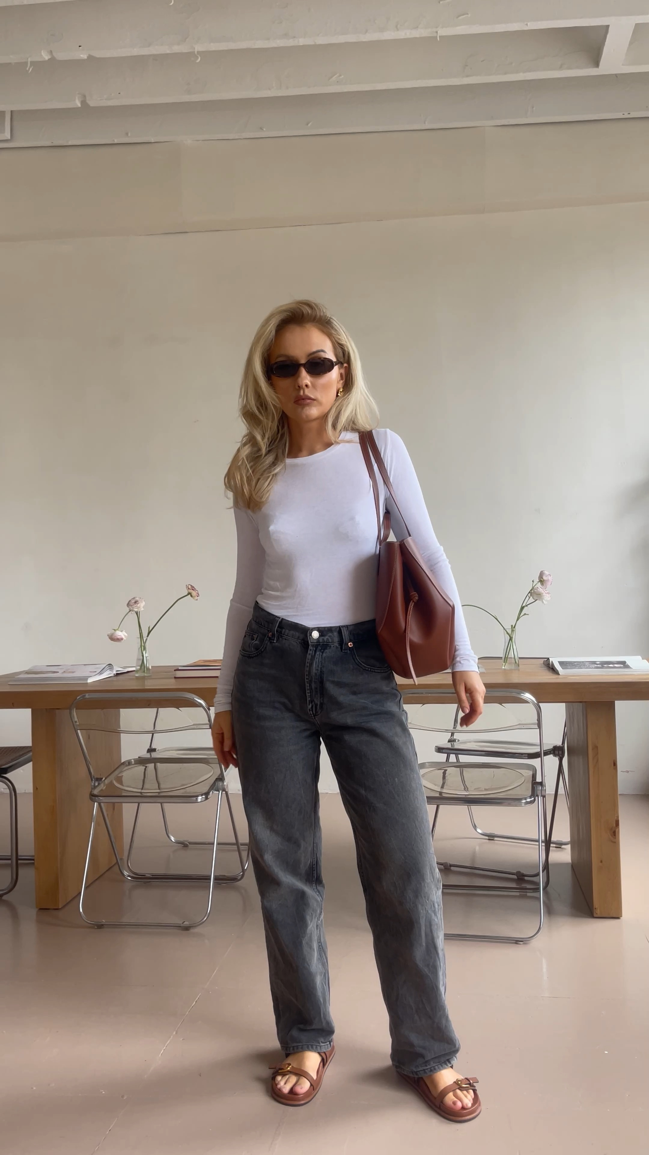 White long sleeve t-shirt, black jeans, leather shoulder bag, brown sandals open toe

#LTKSeasonal #LTKeurope #LTKstyletip