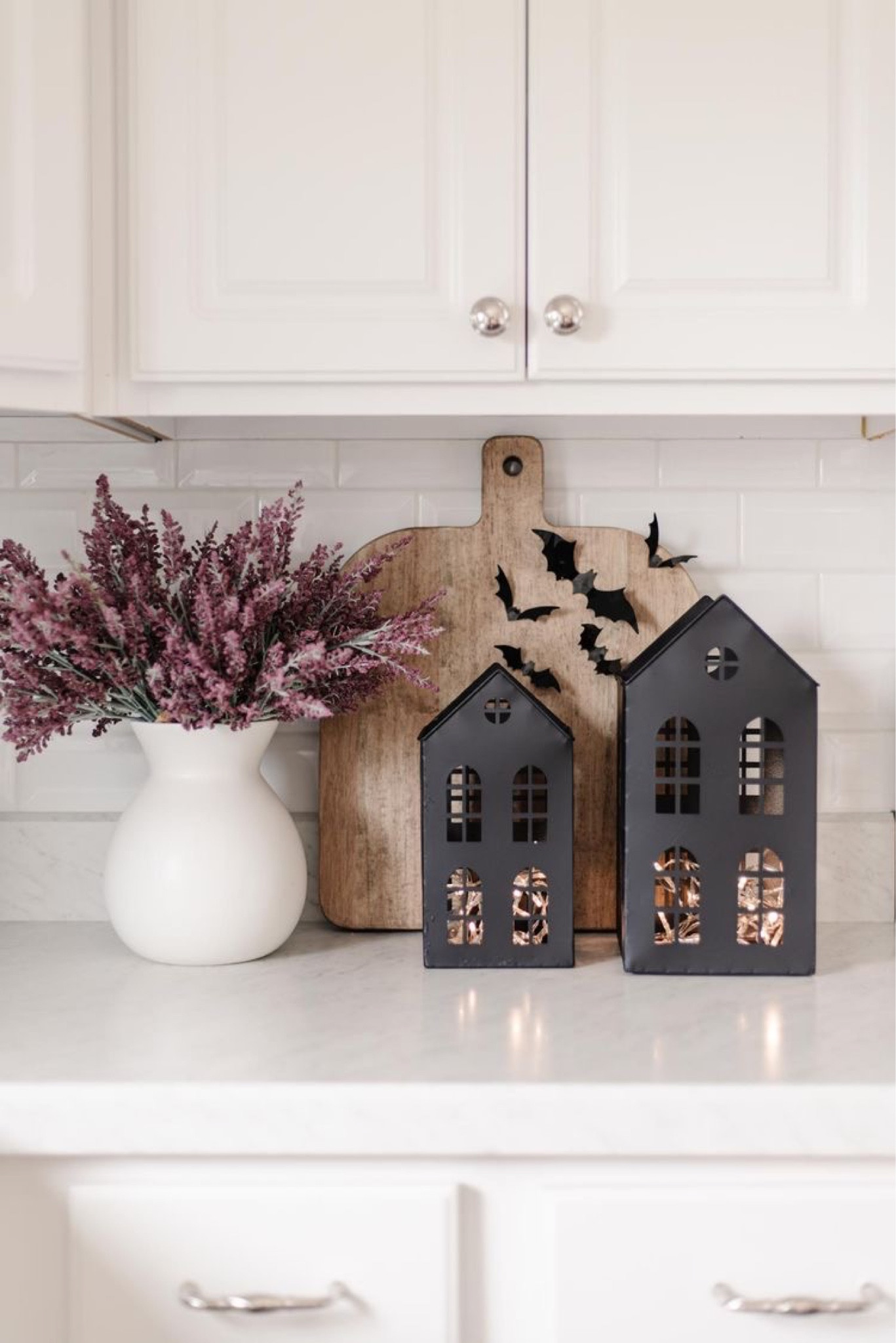 Halloween decor. Paper bags. Wooden cutting board. Metal mini houses. 

#LTKHalloween #LTKhome #LTKSeasonal