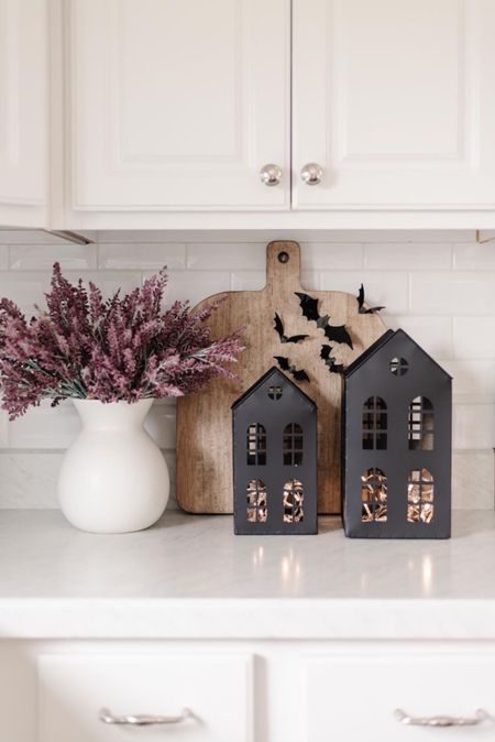 Halloween decor. Paper bags. Wooden cutting board. Metal mini houses. 

#LTKHalloween #LTKhome #LTKSeasonal