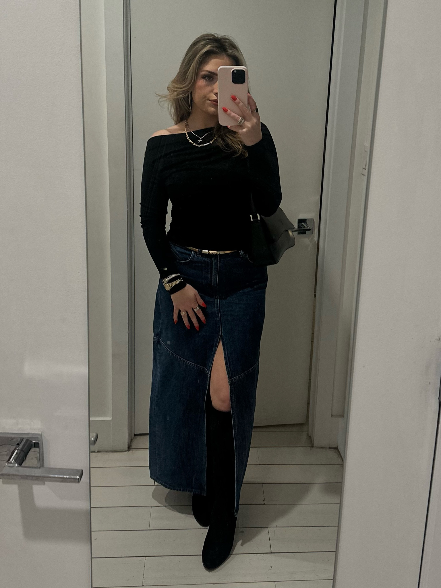 Feeling oh so chic in this long denim skirt on a cold winter date night ❄️ I love pairing this look with an off the shoulder top and a high knee black boot for a little extra flare. What do you think? 

#LTKSeasonal #LTKHoliday