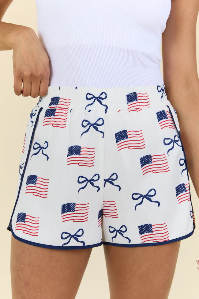 On The Move Flag and Bows Printed Running Shorts | Pink Lily