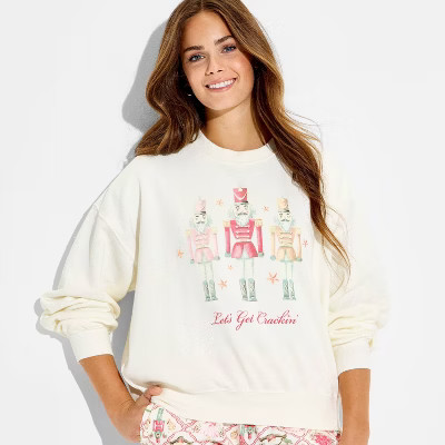 Women's Nutcracker Fleece Graphic Sweatshirt - Off White XS | Target