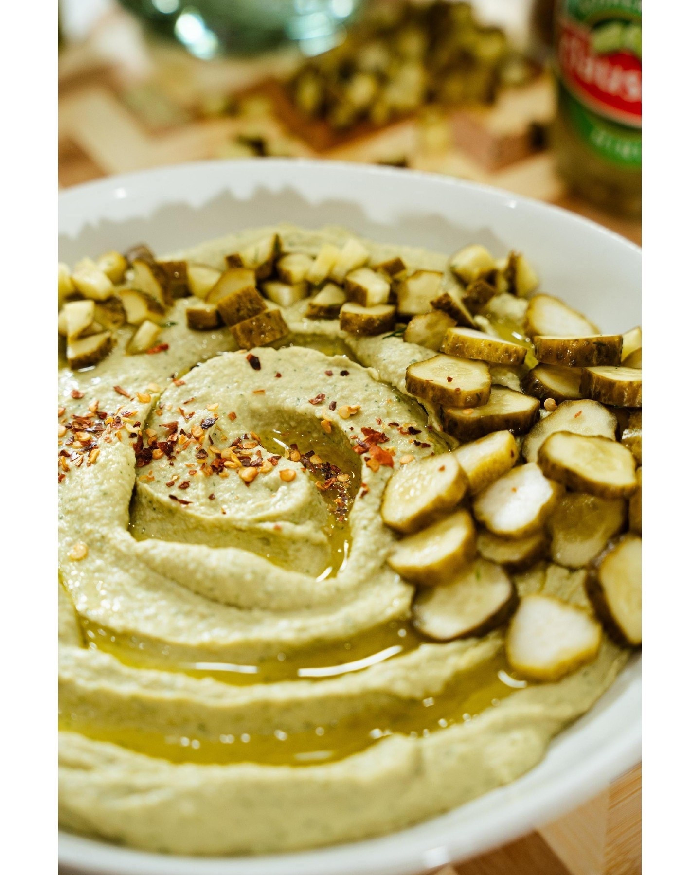 The Perfect Snack for Pickle Lovers 🥒 Dill Pickle Hummus

If you're the type to drink the pickle juice (no judgment here), this one's for you. Creamy, tangy, and full of briny goodness, this hummus is not your average dip.

Pro tip: Blend with ice cubes to slowly loosen the mixture and get that silky-smooth texture. The result is a spread that's just chunky enough to remind you it's packed with real pickles.

Pair it with veggies, crackers, or just a spoon. We won't tell.

🥒 Grab the full recipe with the link in bio. 



#LTKfoodie