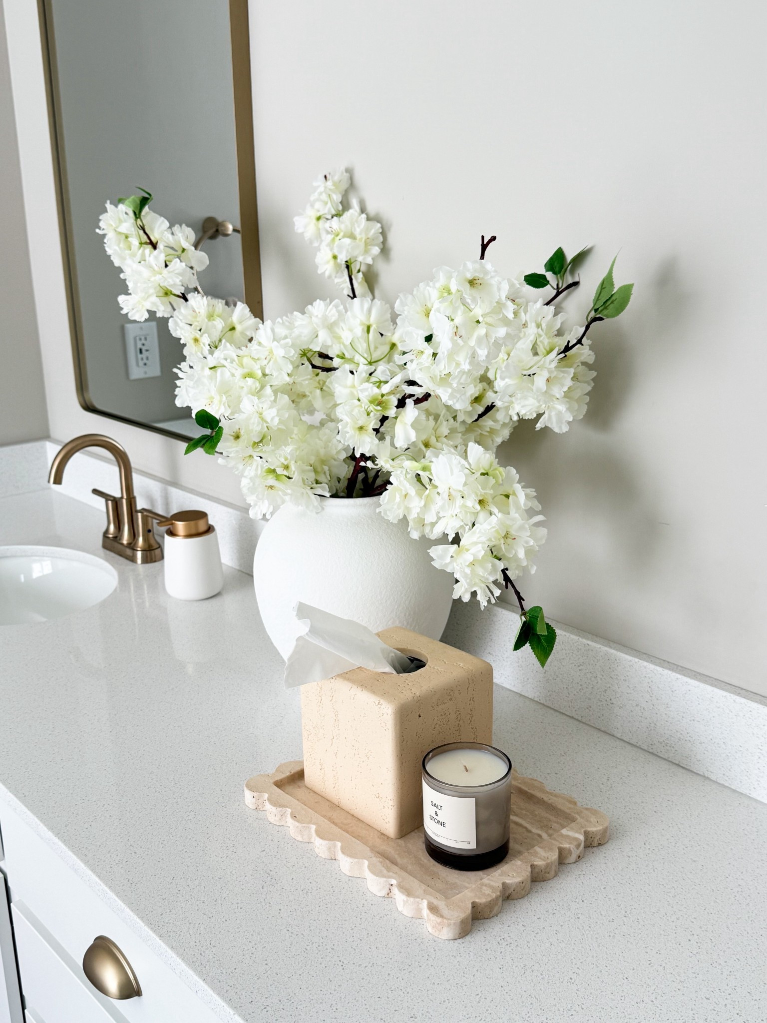 Guest bathroom decor ideas with elegant faux florals, chic vanity styling, stone tray accents, candle decor, and elevated neutral accessories. Simple luxury touches to make your bathroom feel fresh, clean, and designer styled. #LTKHome #BathroomDecor #GuestBathroom #VanityDecor #NeutralHomeDecor #BathroomStyling #HomeDecorFinds #LuxuryHomeStyle #AmazonHome #SpringDecor

#LTKselfcare #LTKBeauty #LTKHome