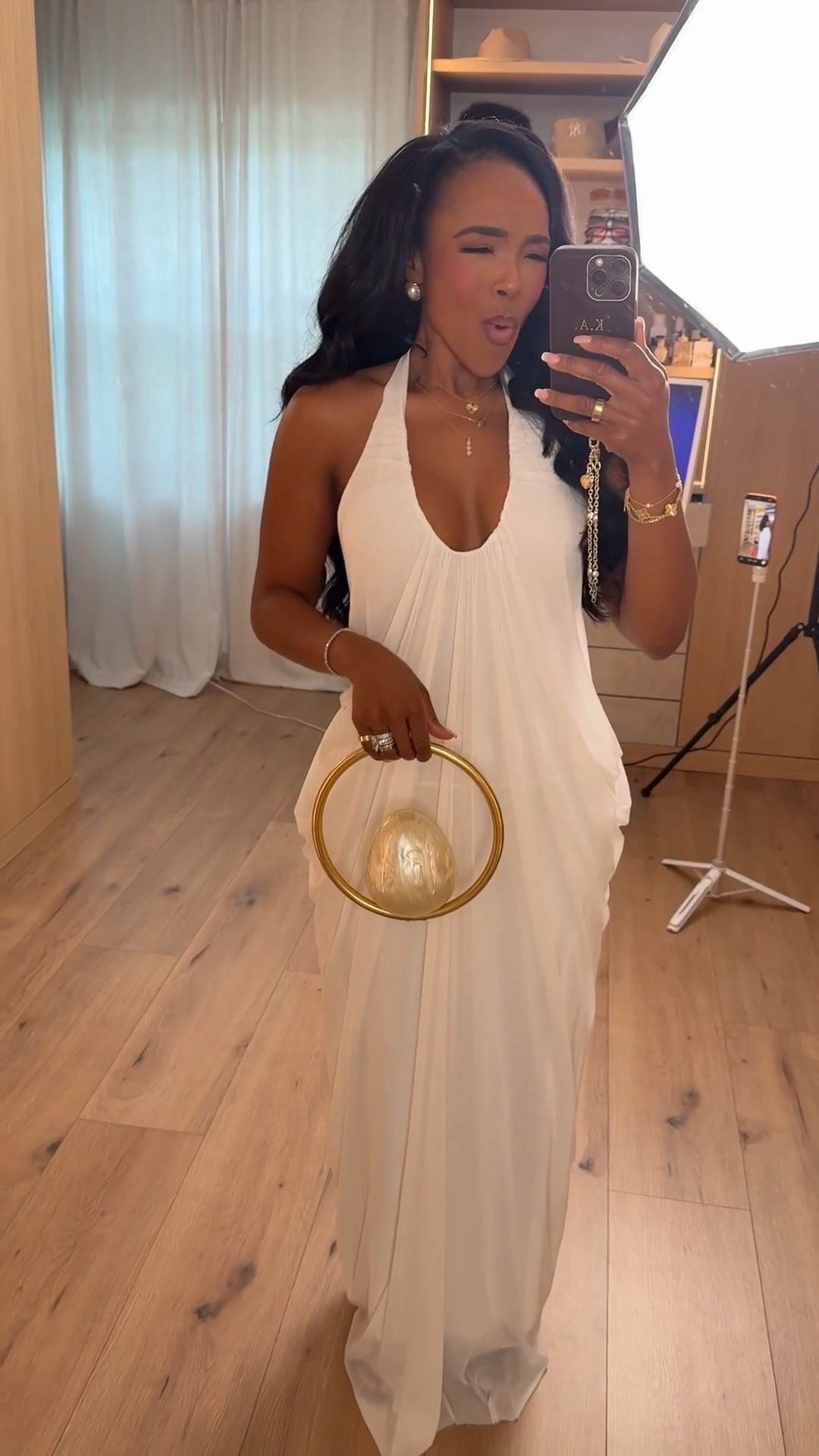 Scroll to shop this elegant white halter maxi dress styled with gold accessories for a timeless evening look. A classic white dress like this is a versatile piece you can wear to multiple occasions, making it a smart wardrobe investment where the cost per wear continues to drop over time.

Perfect for weddings, vacation dinners, bridal events, summer parties, or special evening occasions.

5'4" | 138 lbs | 34D bust | 27" waist | 40" hips

Follow me on Instagram and YouTube @kirasfashionfinds

