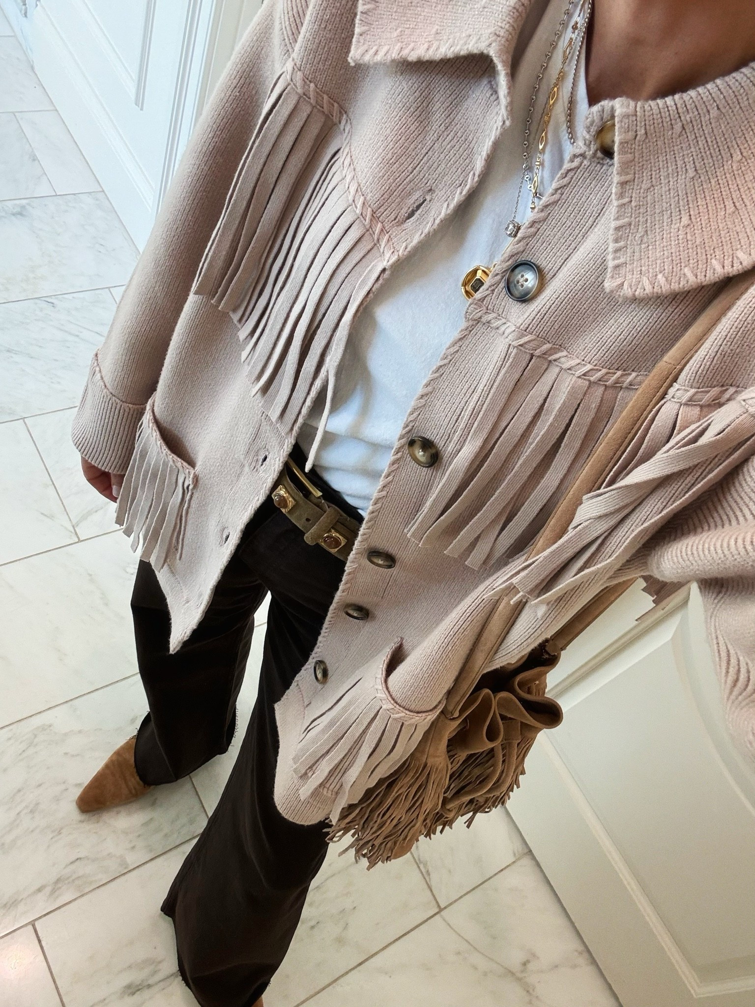 How I’m styling brown denim for fall! Loving all the fringe styles this season

#LTKootd #LTKSeasonal #LTKOver40