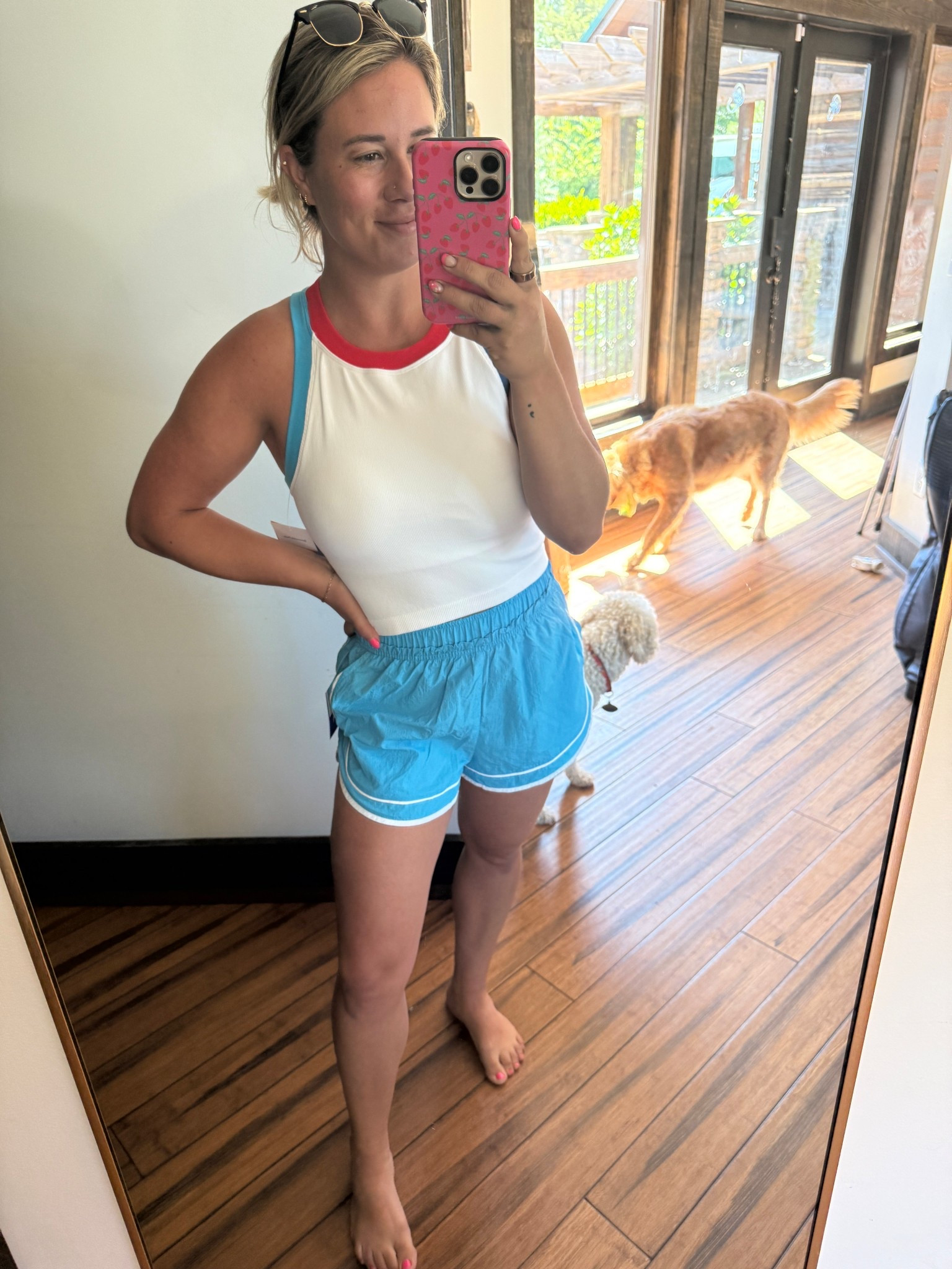 Cute active wear outfit for Memorial Day or 4th of July. Also a great sports mom outfit! 

Red white and blue, athletic blue shorts, track shorts, sports mom, active mom 

#LTKPetite #LTKActive #LTKFindsUnder50