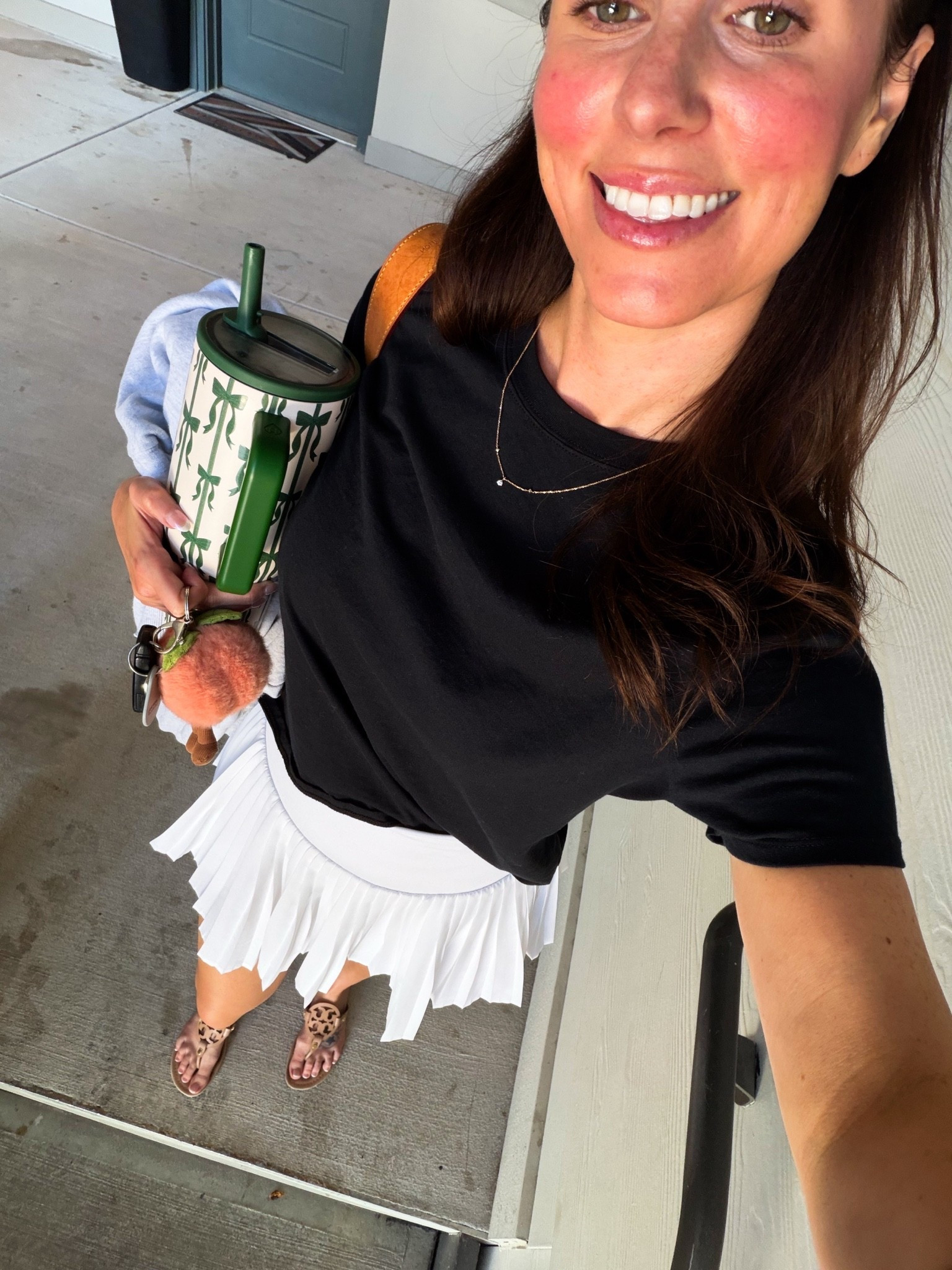 Outfit of the day // white pleated skirt // tennis skirt // white skirt // skort // black tshirt // under $50 // Tory Burch sandals // affordable // casual // hydrojug

#LTKgrwm #LTKdayinmylife #LTKootd
