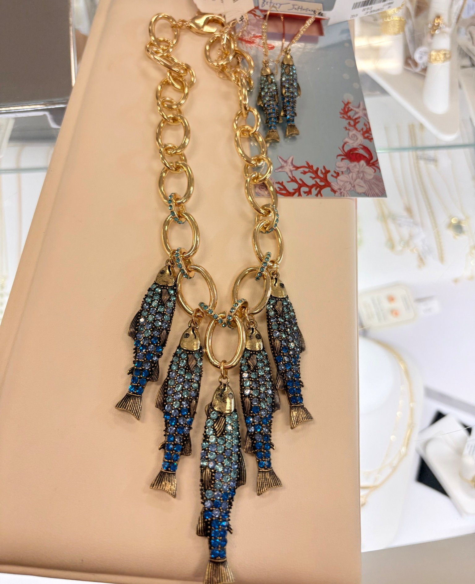 Beautiful Sardines necklace and earrings I found at TJmax 

#LTKSeasonal #LTKSaleAlert
