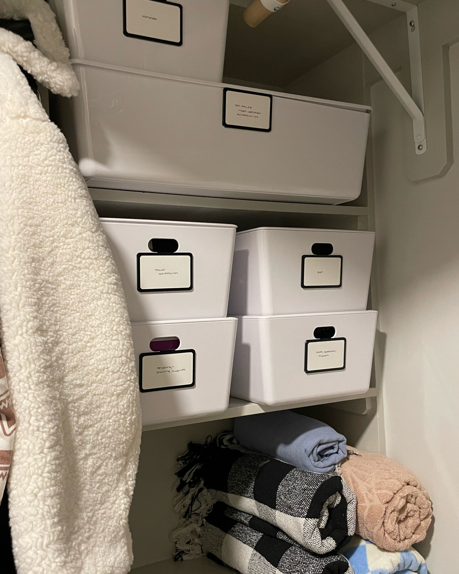 reorganizing my hall closet and i'm so obsessed with these stacking bins and little label holders!! 

#LTKhome #LTKunder50 #LTKFind