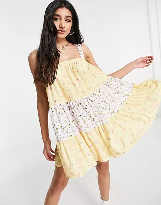 ASOS DESIGN tiered mini strappy sundress in pastel mix match floral print | ASOS (Global)