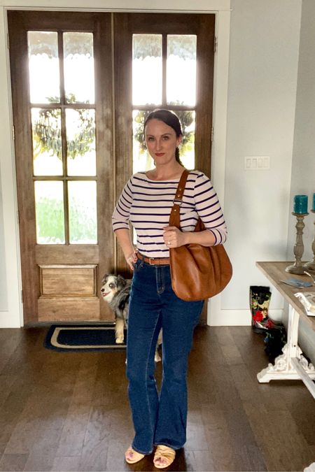 Outfit of the day, OOTD, weekday outfit, spring outfit, SAHM outfit, mom fashion, 3/4 sleeve Breton top, high rise jeans, flare jeans, brown leather tote, brown leather slides, classic fashion, preppy mom, modest but classy, Madewell belt, skinny belt 

#LTKstyletip #LTKunder50 #LTKSeasonal