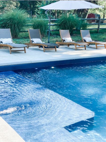 Highly recommend these pool lounge chairs. They’re solid teak with nice weatherproof wicker on the inside. Comfortable and sturdy. They also have tables that slide out of each one and wheels for easy mobility and character! Pillows are Walmart  #LTKFind 

#LTKhome #LTKSeasonal #LTKsalealert