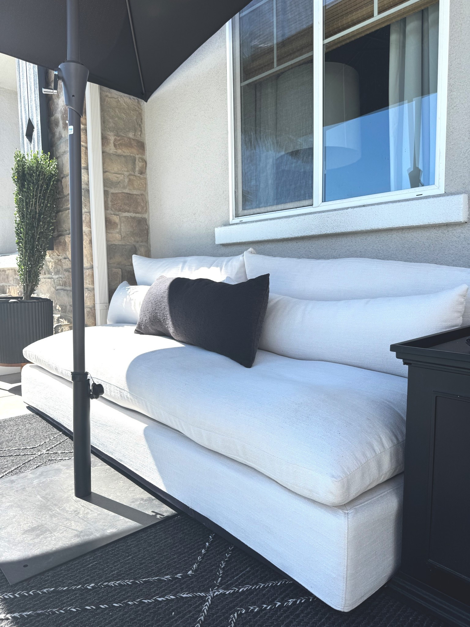 This sofa is so comfortable that you will want to take a nap on it. It’s lasted all summer without any spills! We use a clean dust pan brush to wipe off any debris each week. Note: it’s under an umbrella and it gets covered during rain. It comes in a sectional as well, but the sectional sells out each year. Check back in the spring if looking for a sectional.

I highly recommend for a covered patio or porch, as the fabric will get mildewed if left in the rain. 

#LTKHome #LTKSeasonal