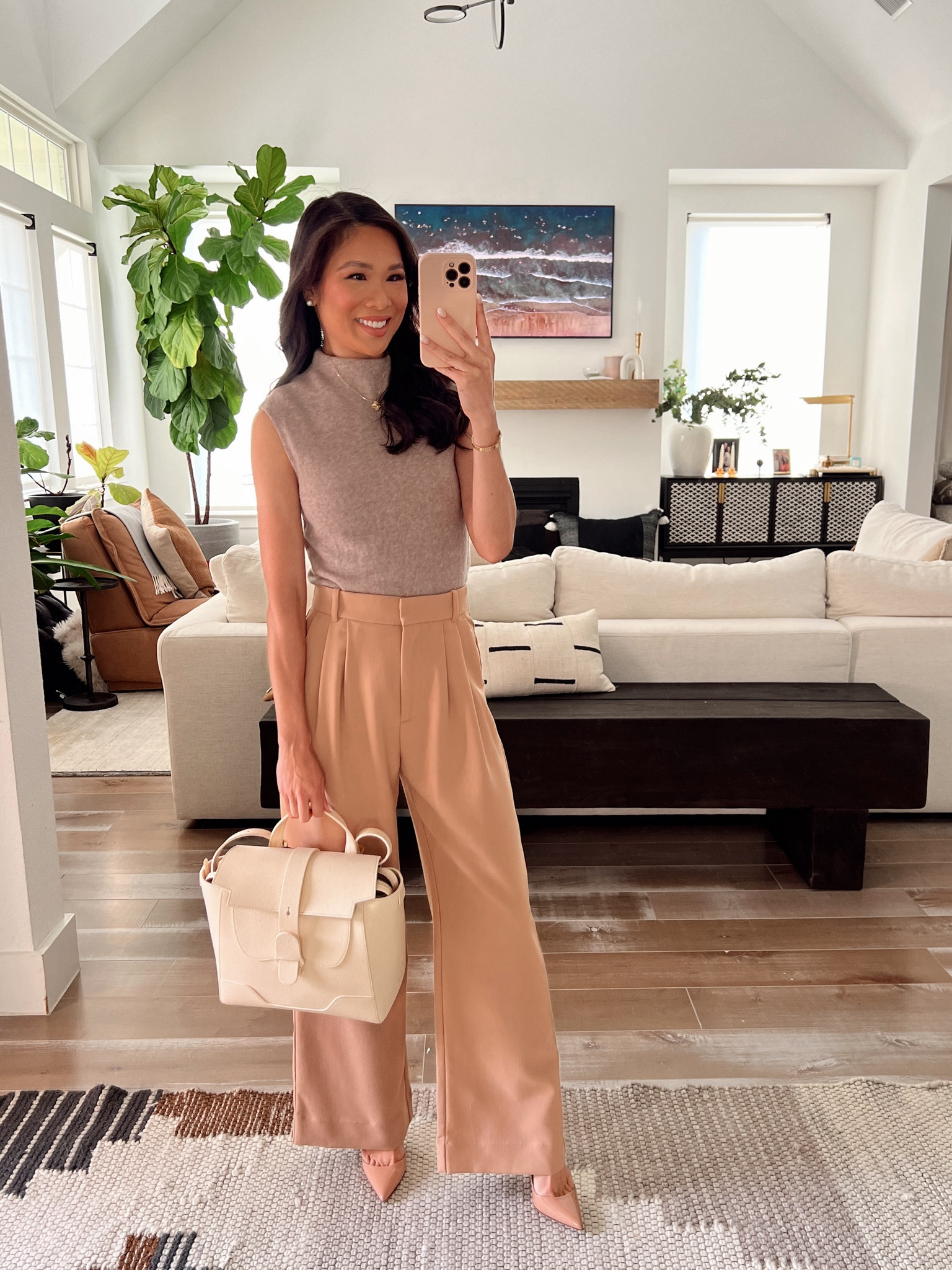 Summer to fall workwear outfit perfect for business casual or teachers outfits with flats. Love this merino wool blend sleeveless sweater and pleated wide leg pants. Wearing size XS short in the pants. My outfit is 15% kff  #LTKxAF

#LTKWorkwear