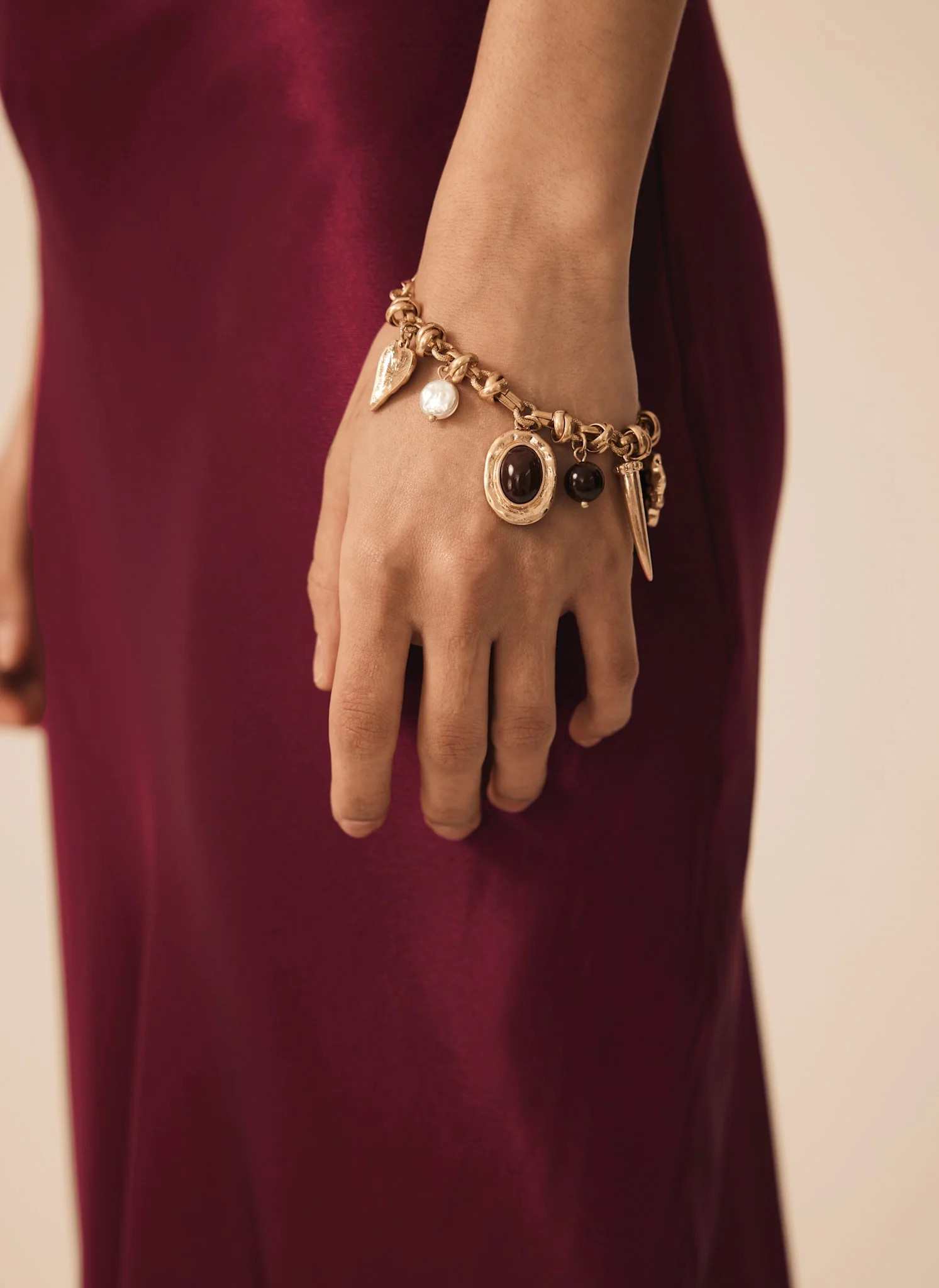 Gold Tone Statement Charm Bracelet | Mint Velvet