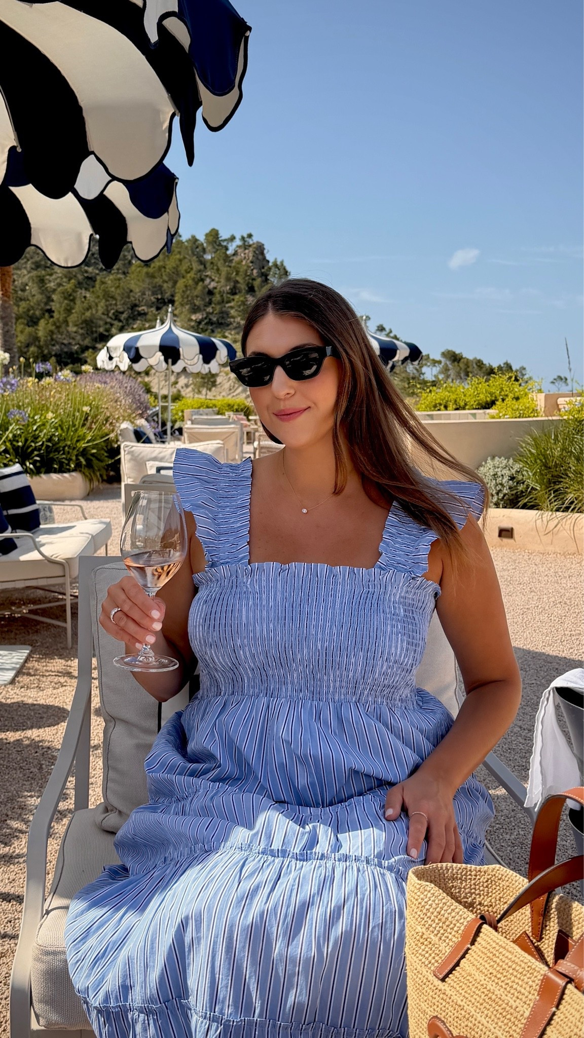 Blue stripes and slow summer afternoons 💙☀️

blue striped dress, summer dress, vacation outfit, European summer style, resort wear, smocked midi dress, ruffle sleeve dress, coastal grandmother style, brunch outfit, vacation fashion, travel outfit, feminine style, beach vacation, straw tote bag, chic summer outfit, resort vacation, effortless elegance, summer wardrobe, vacation style, coastal chic fashion

#LTKTravel #LTKSaleAlert #LTKstorytime