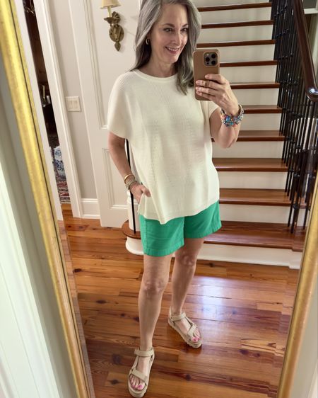 This white Mersea sweater is perfection! Loose fit without being baggy! Side slits. One size. 

Linked shorts are same style just different color. Sandals are last year so colors are different this year. I linked the next Mersea sweater that I plan to get. Per my research, the one size petite is smaller in body and a tad shorter. Will order petite in that one. Love this new brand I’ve discovered! Can’t wait to wear the sweater with my linen pants. #mersea #summerfashion #summersweater 

#LTKSeasonal #LTKOver40 #LTKStyleTip