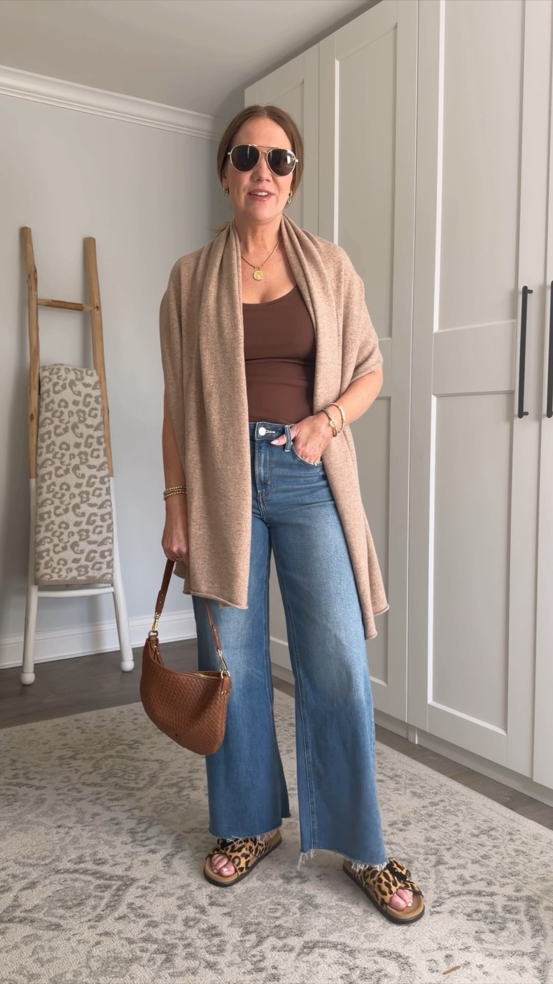 This outfit is chock full of neutral basics I’ll be mixing into outfits all season.
Jeans: $50 look for less for the $249 Paige Annessa jeans ✔️
Ribbed tank: Classic cotton base layer that pairs with anything and everything ✔️
Cashmere wrap: year round staple that doubles as a blanket✔️
Leopard sandals: comfier and cuter than Birks and the perfect pop of print✔️

Classic and timeless style, capsule wardrobe, over 40 style, the most flattering jeans, wardrobe staples
#styleover40 #effortlessstyle #howtostyle 



#LTKOver40 #LTKSeasonal #LTKootd