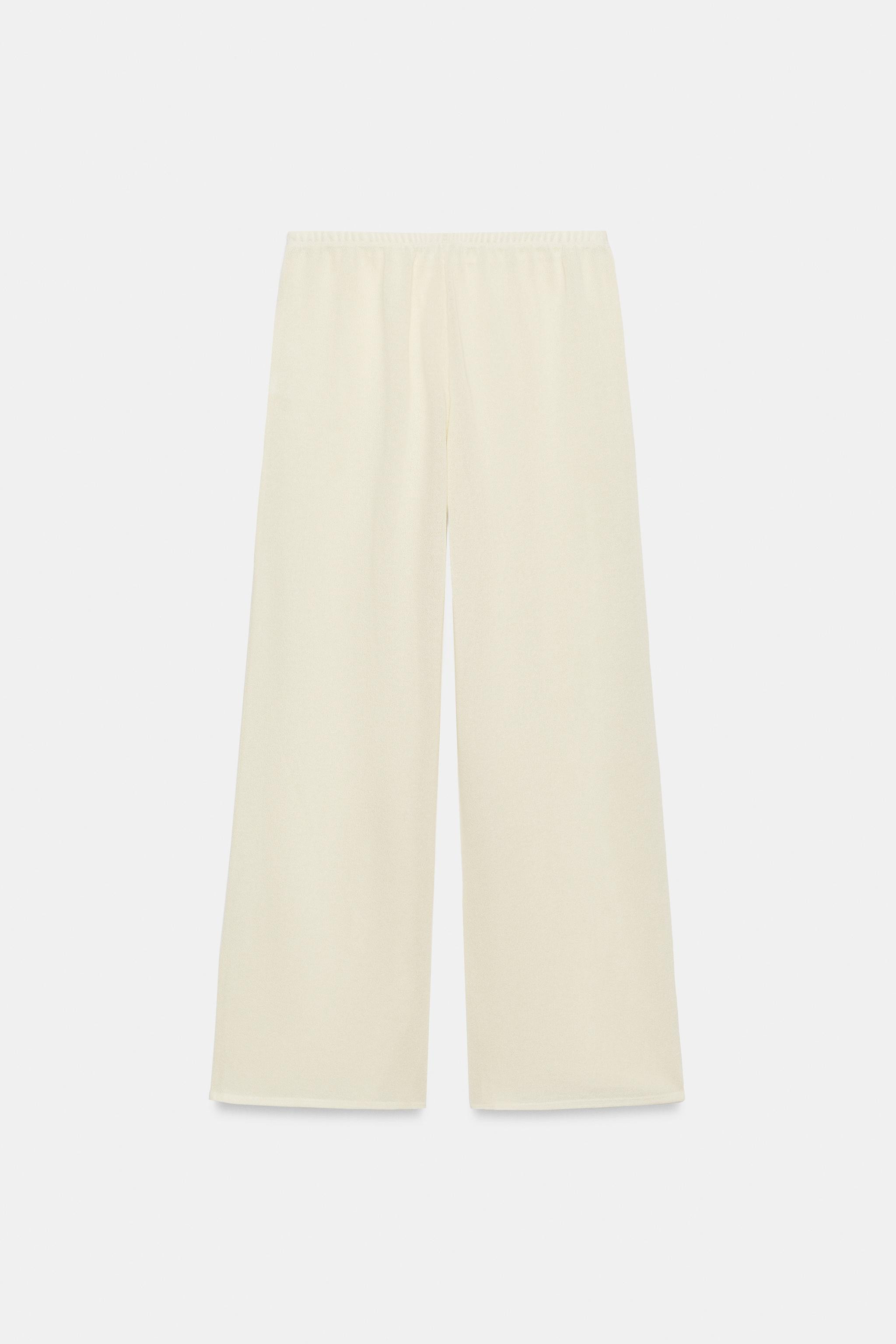 Pants made with viscose blend yarn. Mid-rise with an elastic waistband. Straight leg. | Zara US