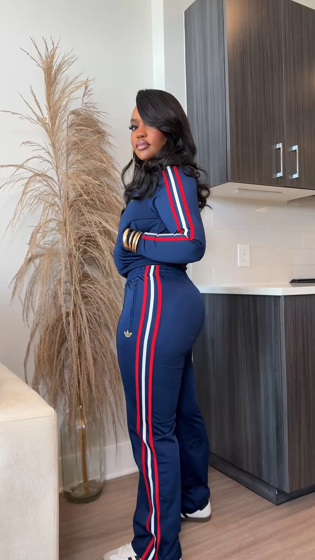 This tracksuit is such a classic for fall 💙 The Night Indigo jacket has a fitted, cropped silhouette with red + white stripe detailing, paired with the matching relaxed track pants. Perfect for travel days, errands, casual weekends or styling with your favorite sneakers for an easy sporty look. Wearing a size Small in both the jacket + pants.

#LTKootd #LTKgrwm #LTKActive