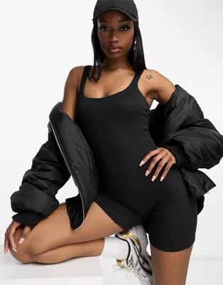 ASOS DESIGN strappy soft touch unitard playsuit in black | ASOS (Global)