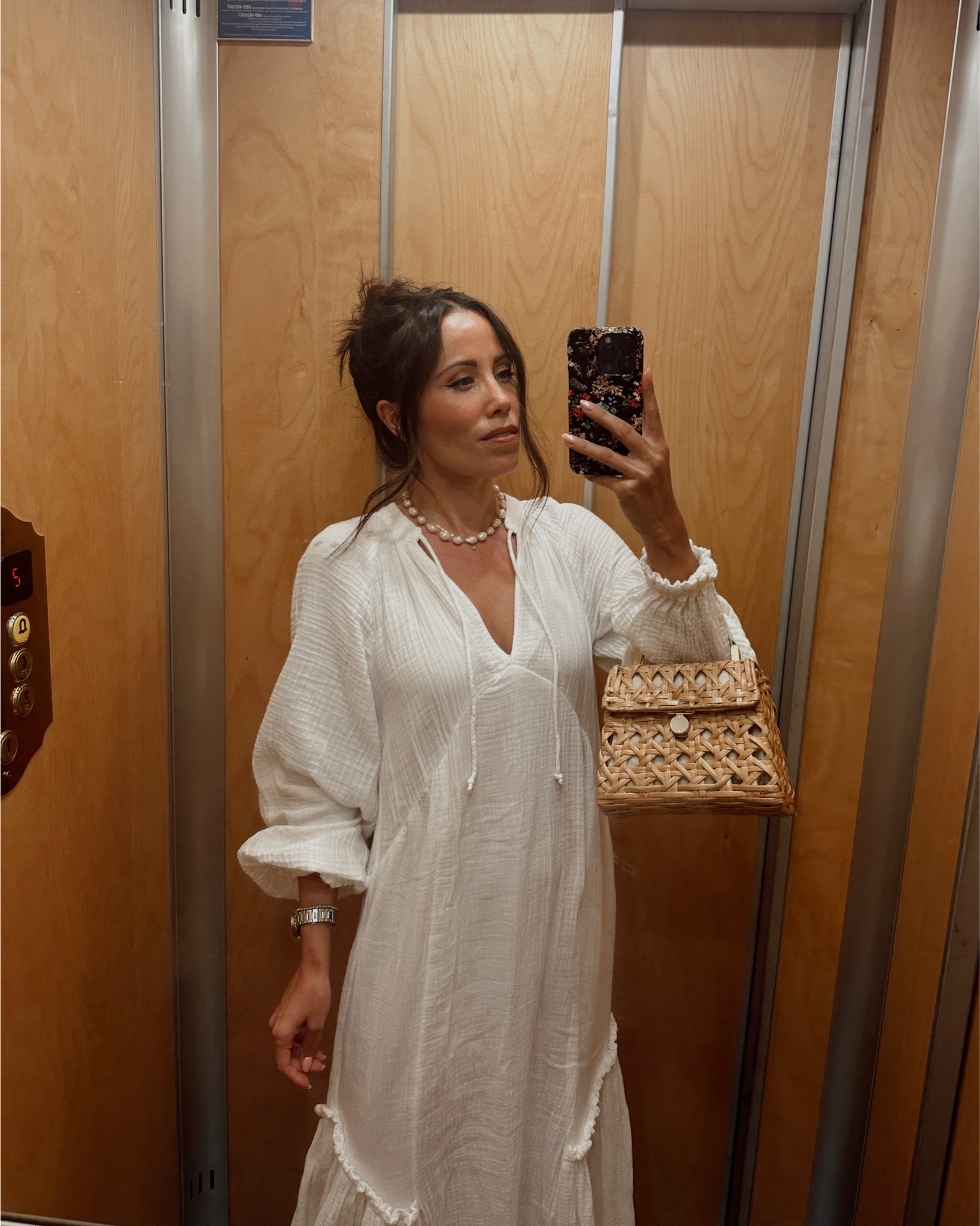 A muslin bell sleeve flowy white dress for a late summer early fall transitional weather dinner on the Amalfi coast in Positano. Paired with a pearl necklace, hair up to show a little skin and a rattan bag to compliment the easy and relaxed honeymoon look 🤍👜

Dress is originally from H&M about 3 or so years ago! 

#LTKStyleTip #LTKSeasonal #LTKWedding