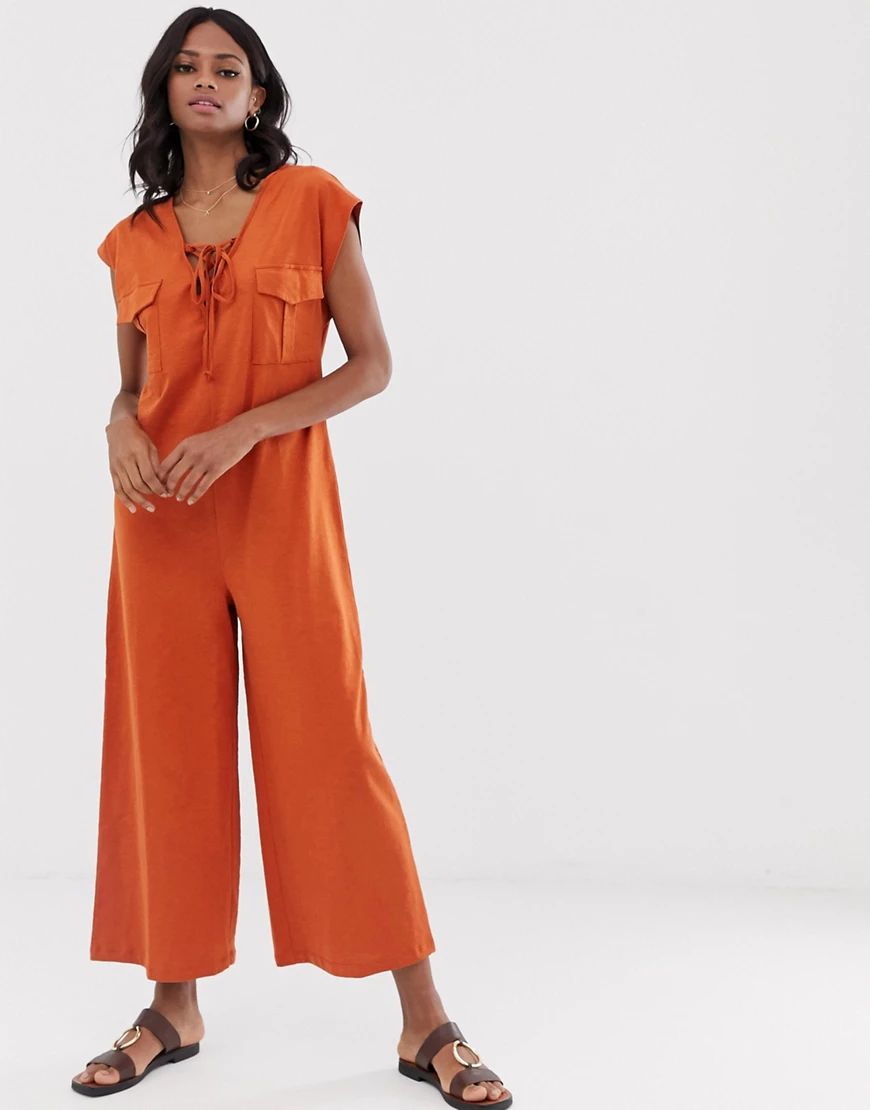 ASOS DESIGN minimal jumpsuit with lace up and pockets-Orange | ASOS (Global)
