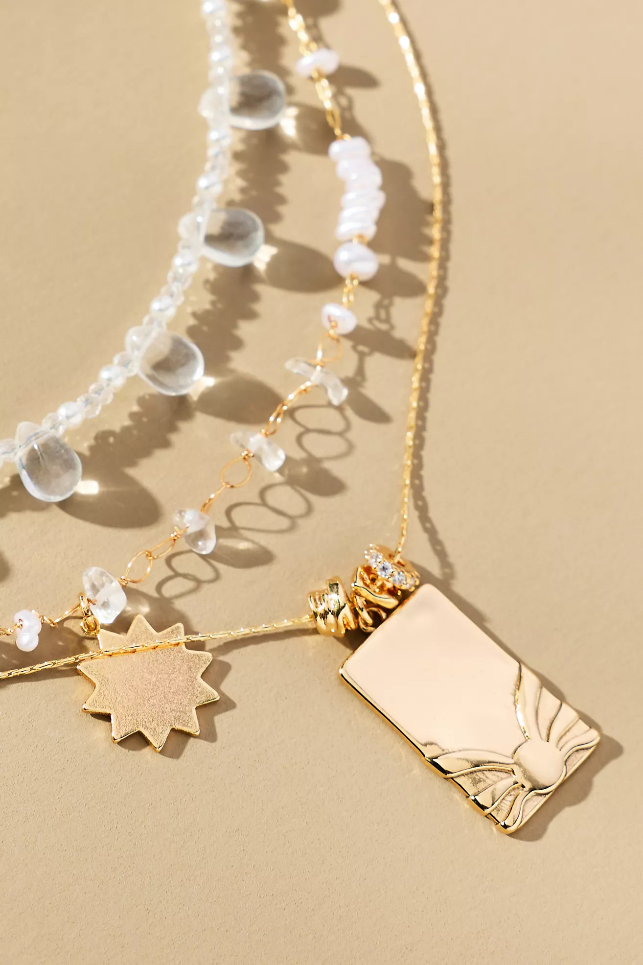 Shades of Sea Layered Necklaces: Charm Edition | Anthropologie (US)