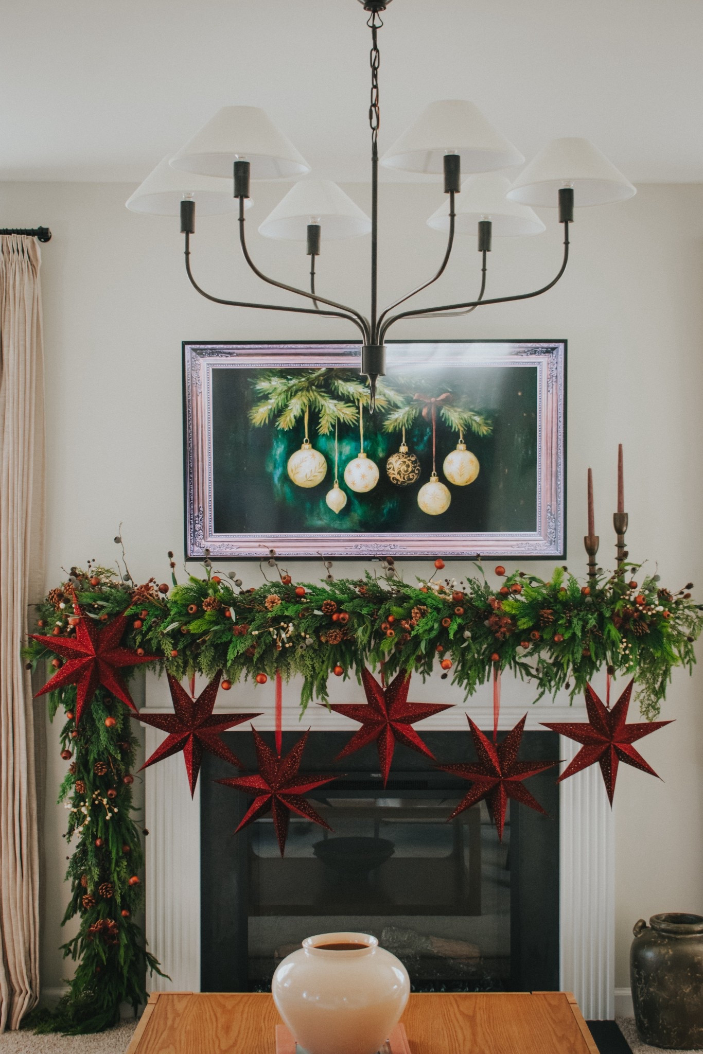 Christmas mantle. Christmas garland. Stars. Paper stars. Red Christmas star. Garland styling. Mantle stinking. Fireplace mantle. Christmas styling. Christmas decor  

#LTKHoliday #LTKHome #LTKSeasonal