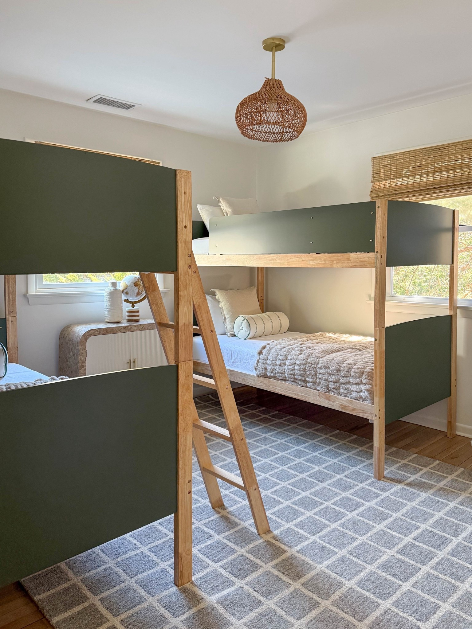 Rental homes should fit as many heads in beds as possible. This bunk room does just that while maintaining design & style. All the items in this room are budget-friendly and guest-proof. 

 