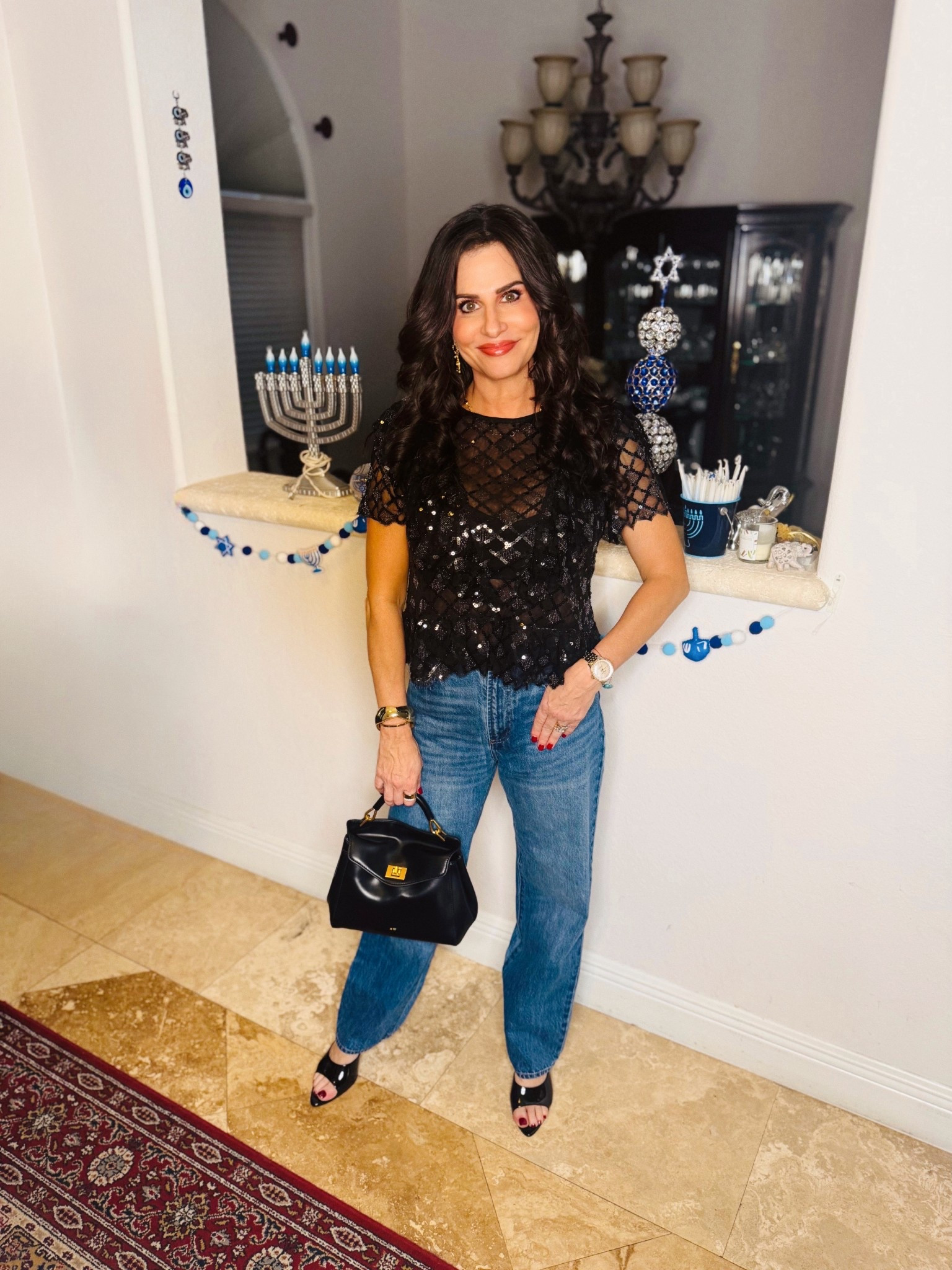 Sequin top , so pretty - perfect for the holiday season . Wearing a sm , jeans 25 . The top is sheer so I sm wearing a cami . #gno #sequintop #festivestyle 

#LTKOver40 #LTKHoliday #LTKSeasonal