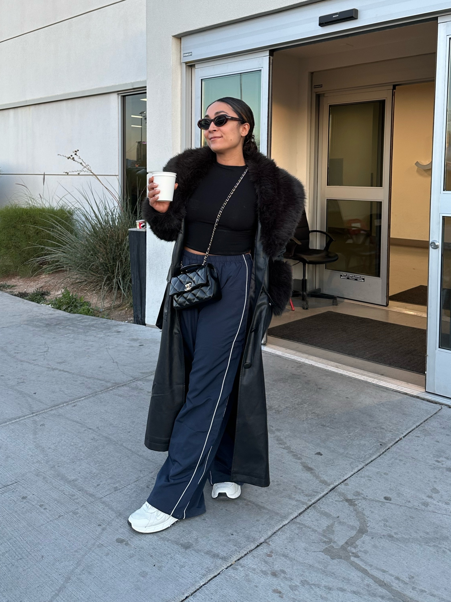 Faux fur and track pants with sneakers and a long sleeve tee. 

#LTKSeasonal #LTKstyletip