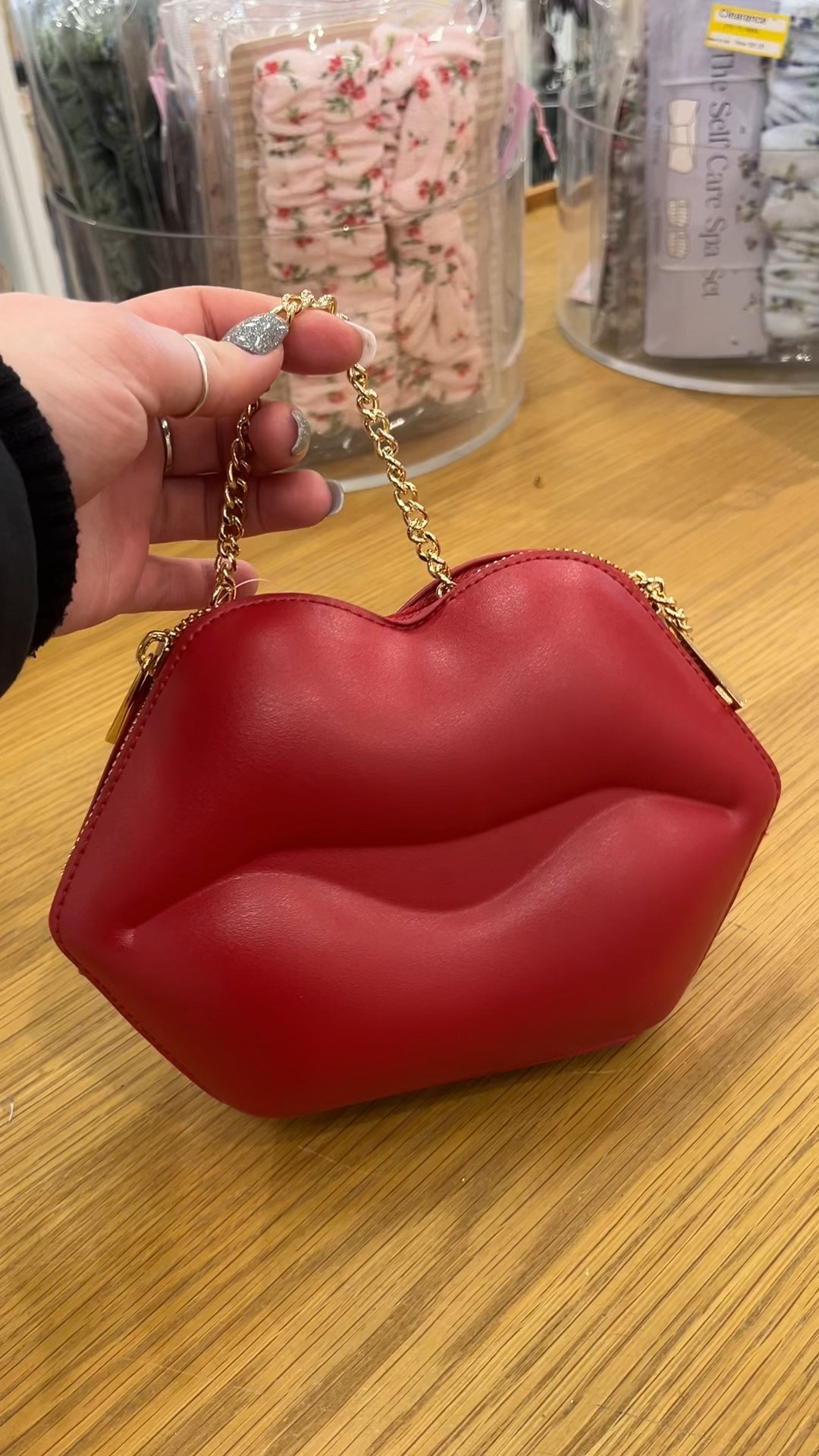 This lips clutch is giving Valentine’s Day energy all year long. The glossy lip shape + gold chain crossbody makes it the perfect statement accessory for date night, Galentine’s, weddings, or any outfit that needs a little extra sass.

Wear it as a clutch or throw on the chain for hands-free glam 💄✨ Such a fun pop for neutral outfits, red dresses, or a classic little black dress. 🔥

Valentine’s Day clutch, lips clutch purse, lip shaped bag, gold chain crossbody, statement clutch purse, date night purse, dressy crossbody bag, Valentine’s accessories, cute clutch bag

Novelty purse, heart purse, glam handbag, red statement bag, pink clutch purse, trendy handbags, fashion accessories, girls night out bag

Evening bag, wedding guest clutch, small purse, crossbody clutch, gift ideas for her, Valentine’s Day gift for her, Galentine’s Day gift, affordable statement bag

Statement accessories, dressy handbag, neutral outfit accessory, special occasion purse, going out bag, party clutch

#LTKSeasonal #LTKootd #LTKFindsUnder50