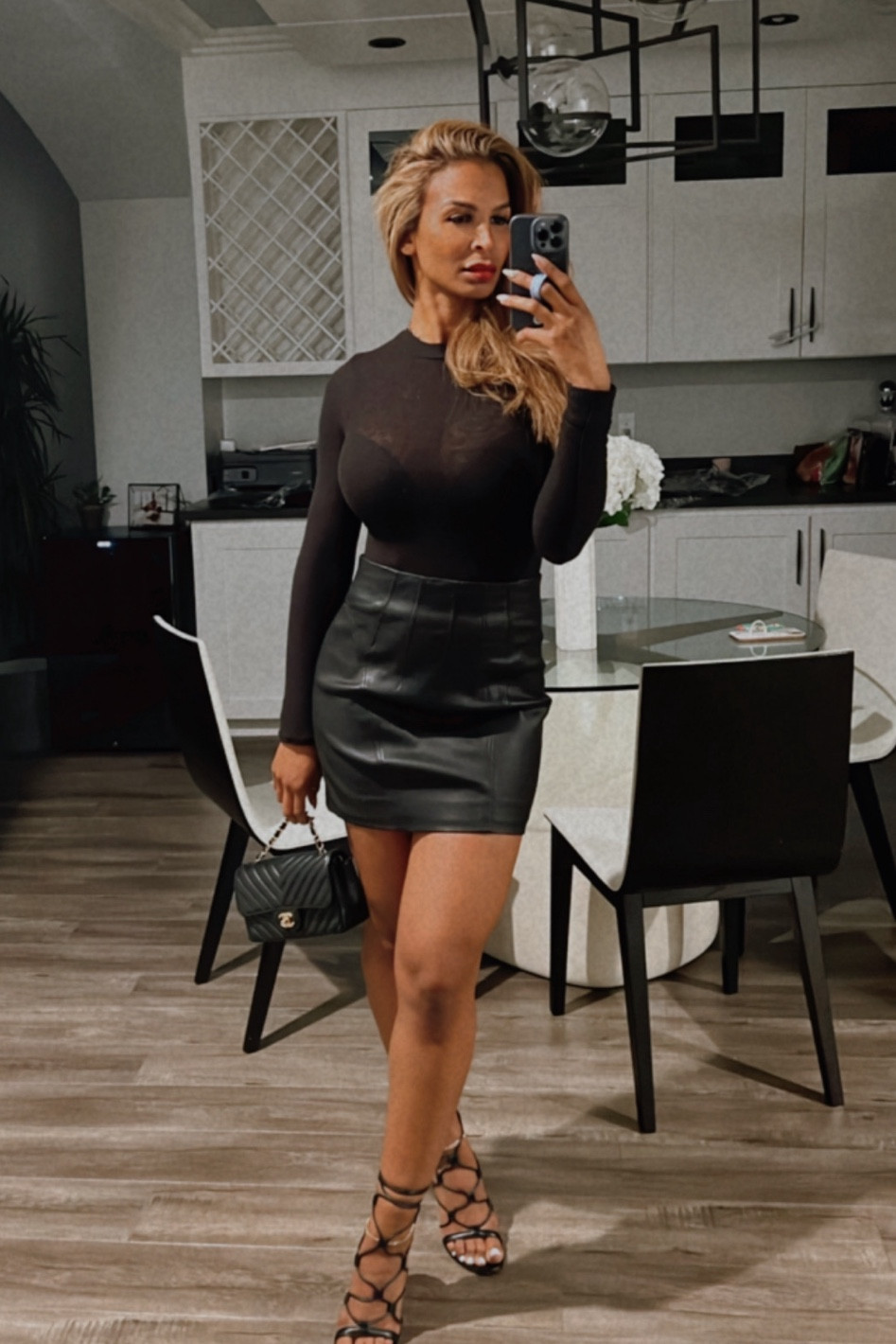 This skirt is almost $200 OFF it’s original price. I’m wearing a size small 🖤

#LTKstyletip #LTKsalealert