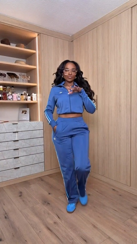 Hi Babes! 💙✨

Matching sets will forever have my heart, and this one is SO good. It's sporty, flattering, and gives that effortlessly put-together look with basically zero effort.

Fit Details:
• Blue matching track set
• Cropped zip-up jacket
• Wide-leg track pants
• Coordinating sneakers
• Everyday gold accessories
• Trendy oversized glasses

Where to wear:
• Airport travel
• Running errands
• Coffee runs
• Casual weekends
• Athleisure days
• Travel days

Everything is linked below!

xx, Kira | IG: KirasFashionFinds

Measurements: 5'3" | Wearing Size XS
