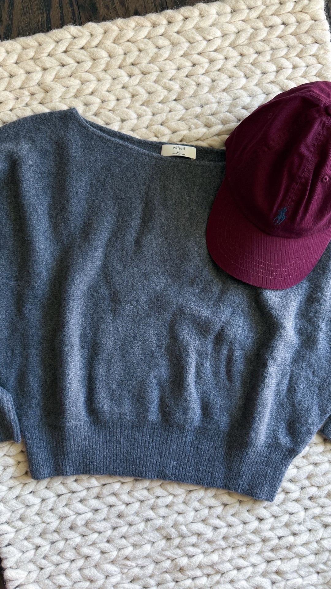 Obsessed with this cozy, rich combo right now. A gray Aritzia Wilfred sweater (XS) paired with my new burgundy Polo Sport hat. The sweater is the perfect elevated basic for fall & winter, soft + cozy but still chic enough to dress up or down. I love pairing it with trousers, denim, or even layered over dresses. The Polo hat adds the best pop of color for a casual vibe.

Aritzia sweater - Wilfred sweater - grey cashmere sweater - oversized fall sweater - cozy neutral sweater - Aritzia fall basics - winter capsule wardrobe - Polo Sport hat - burgundy baseball cap - classic polo hat - casual fall outfits - neutral fall fashion - sporty chic style




#LTKStyleTip #LTKGiftGuide #LTKU