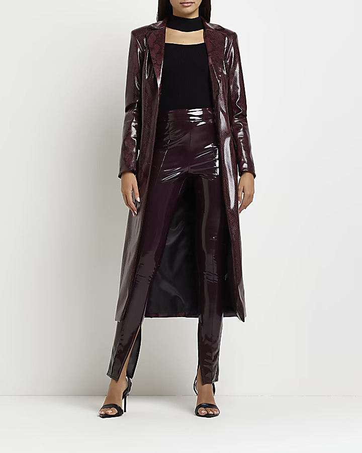 Red faux leather vinyl skinny trousers | River Island (US)