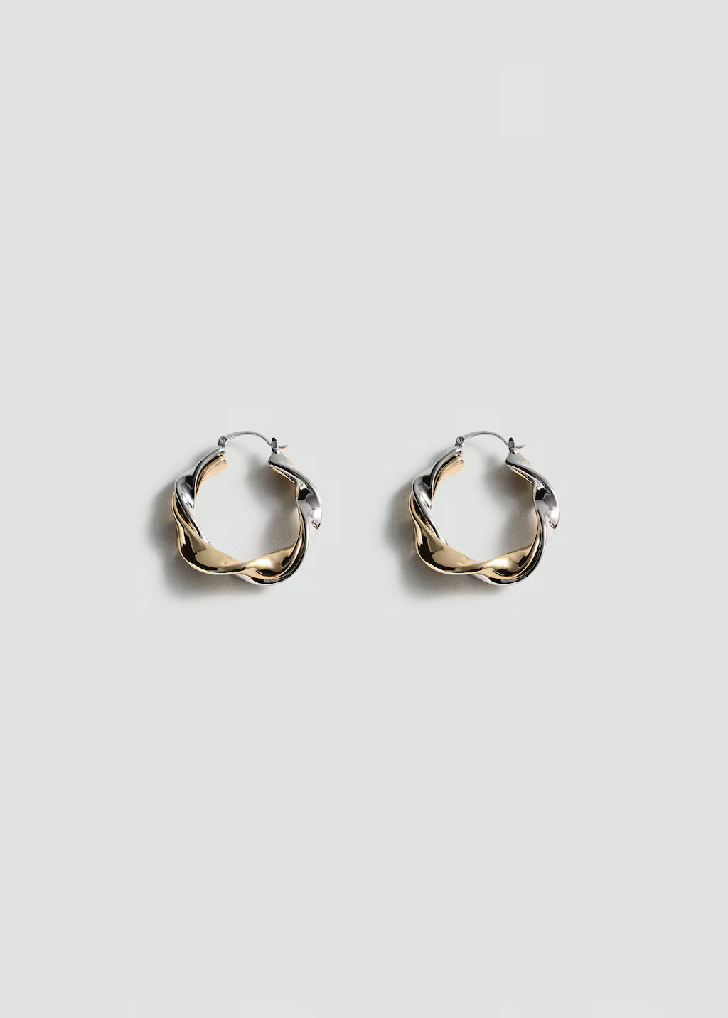 Twisted hoop earrings - Women | MANGO USA | Mango (US/MX/AU)