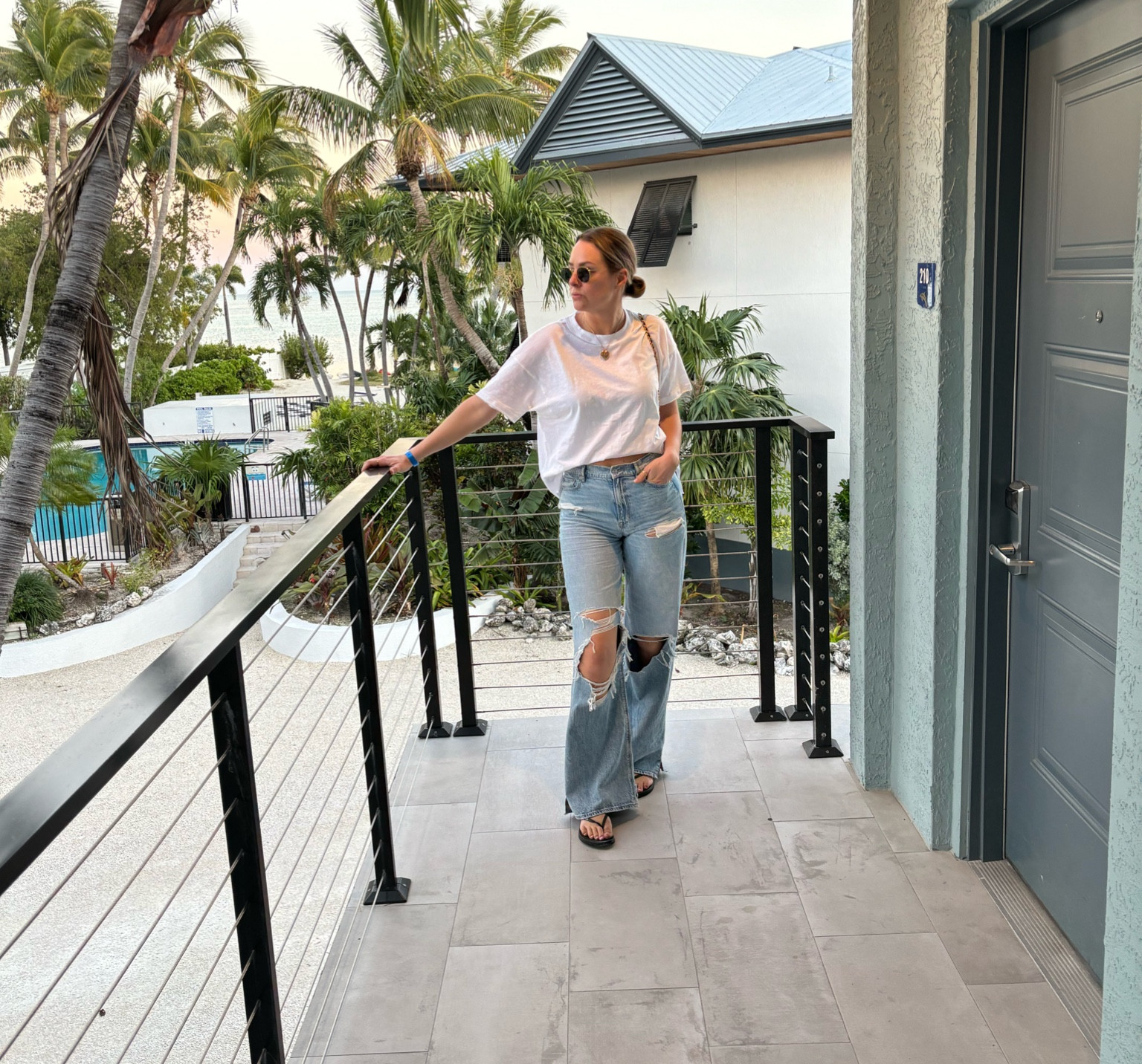 The PERFECT ripped, high waisted jeans. I would live in these every day if I could! So soft + comfy, so flattering on all body types. Plus great for the tall girlies! Plus this tshirt is one I will be reordering as it’s the perfect layering tee! 

#LTKmidsize #LTKSeasonal