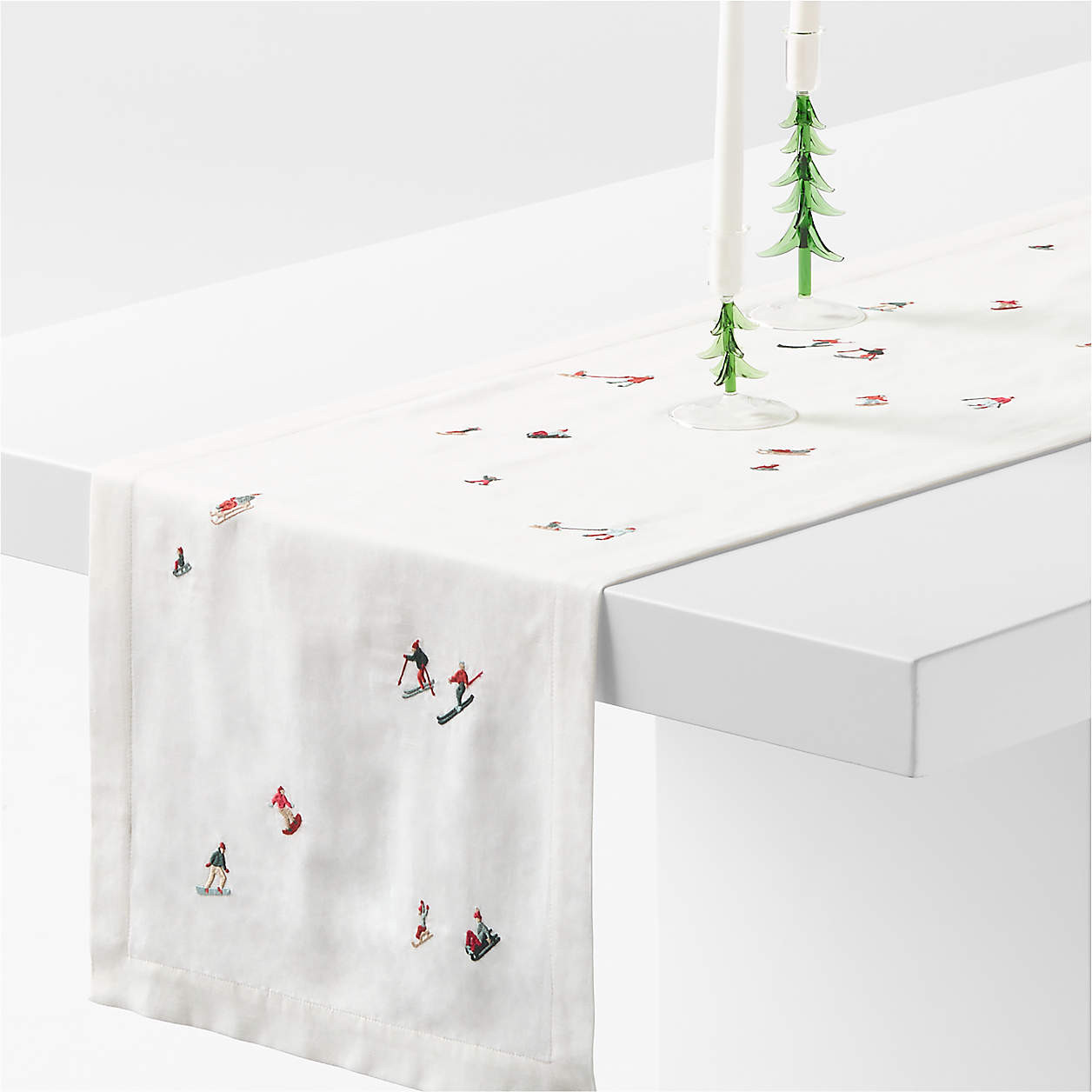 Embroidered Skier 90" Table Runner | Crate & Barrel | Crate & Barrel