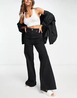 Levi's 70's high loose flares in black | ASOS | ASOS (Global)